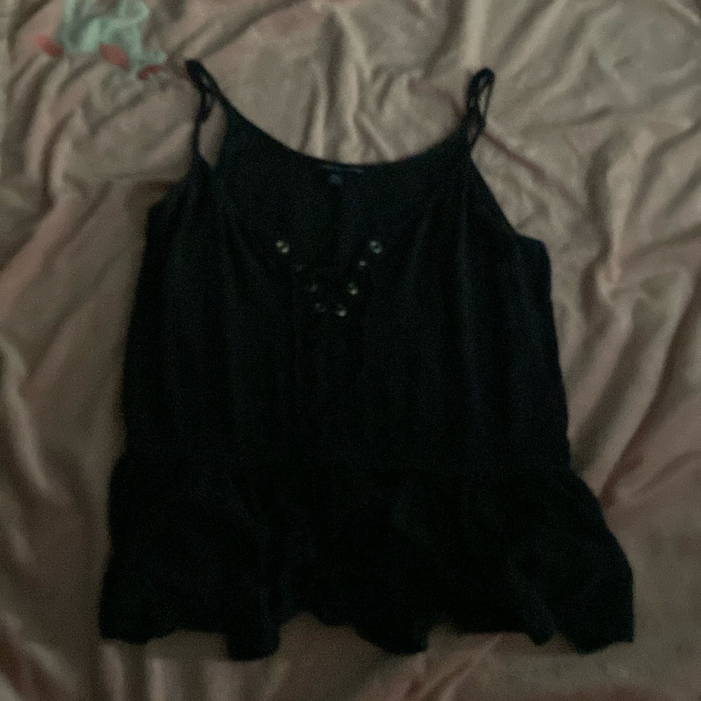 Dark blue shirt.